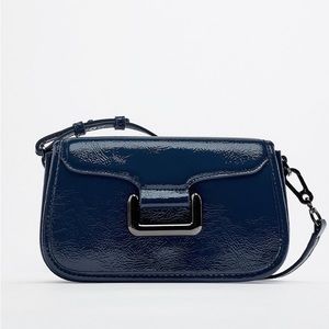 CROSSBODY BAG WITH METAL DETAILS